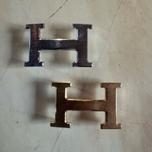 Hermes Silver and Gold Belt Buckle Pair